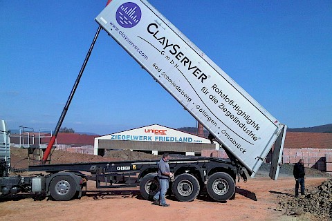 External raw materials are delivered for the modern brick production (2011)